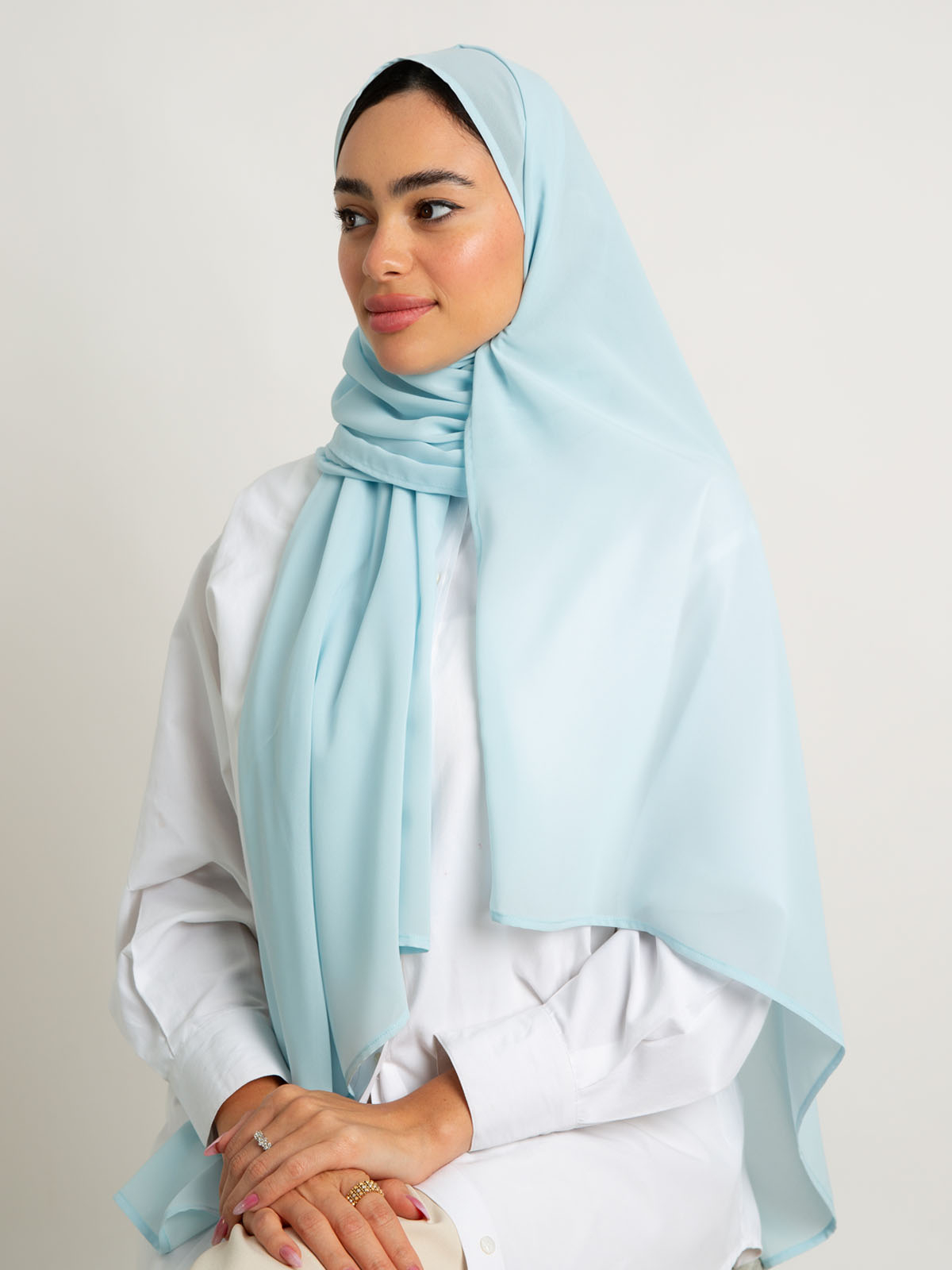 12a002fw2507saplbl-baby-blue-laser-tarha-plain-laser-tarha-1-base.jpg طرحة ليزر أزرق فاتح - الصورة 1