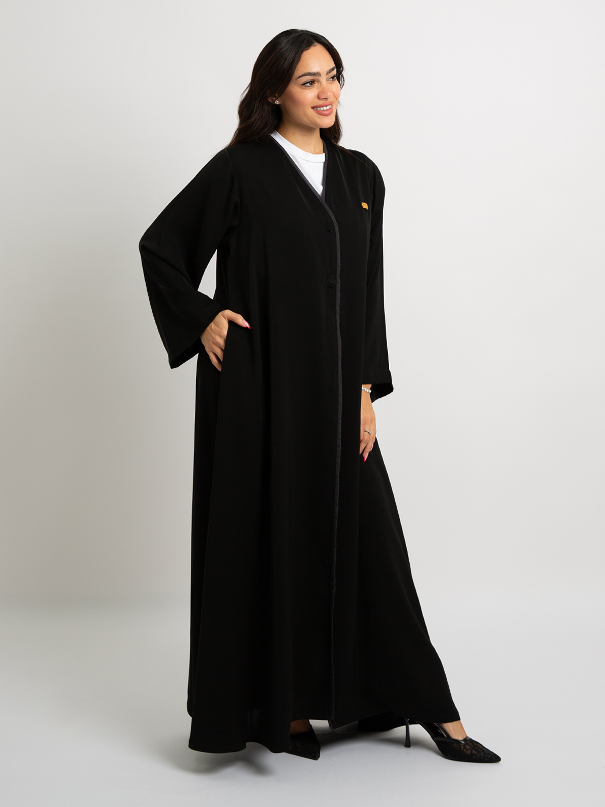 28002fw258saplbk-black-executive-abaya-half-cloche-a-cut-long-closed-abaya-in-crepe-fabric-2-base_1.jpg العباية التنفيذية أسود - الصورة 1